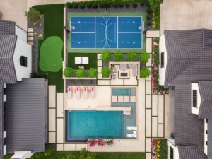 Drone shot of Fair Oaks with sports court, pool and more